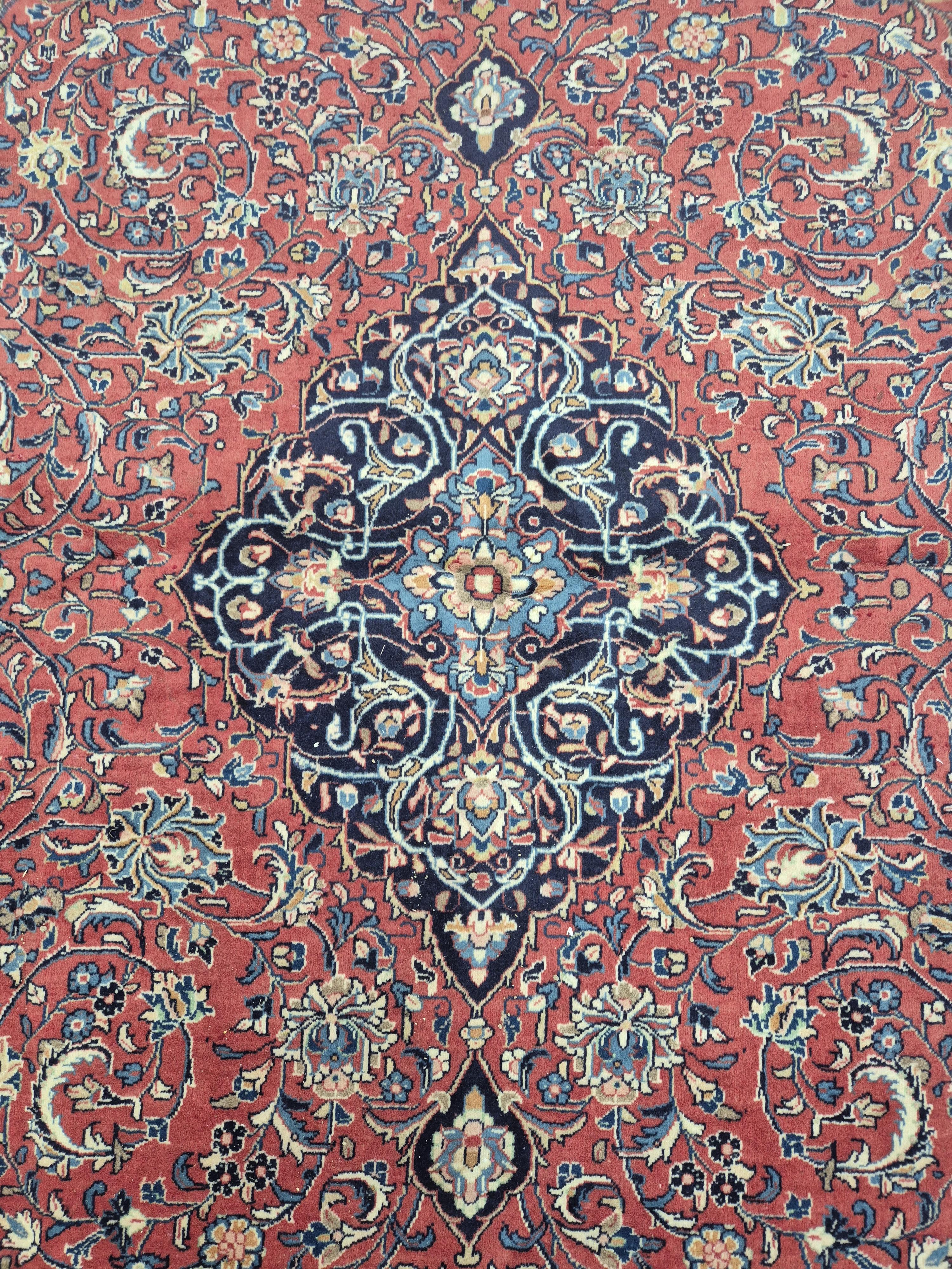 A Sarough brick red ground carpet, 340 x 250cm. Condition - good